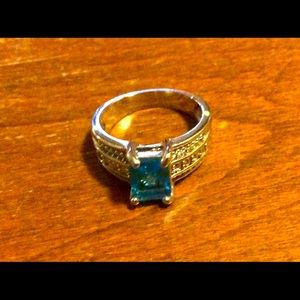 Clear blue topaz colored ring
